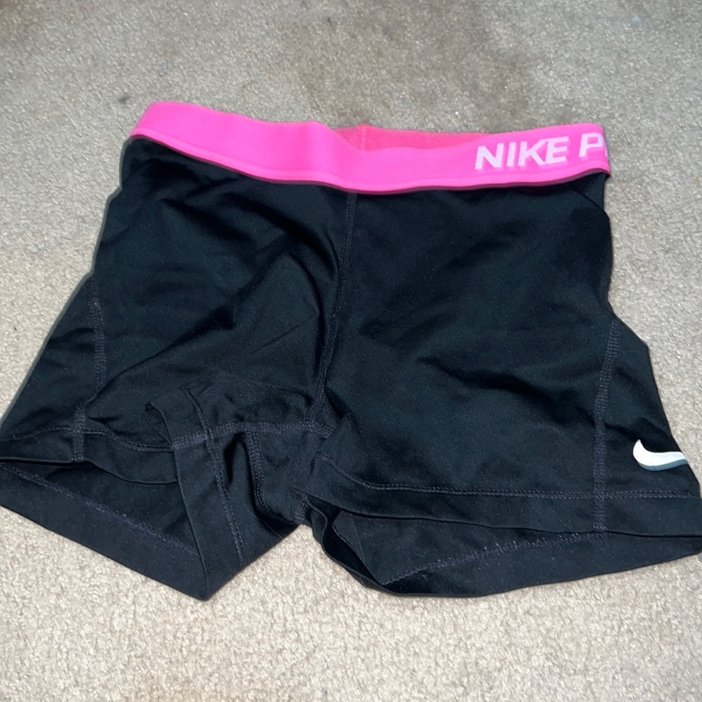 Hot pink Nike Pros